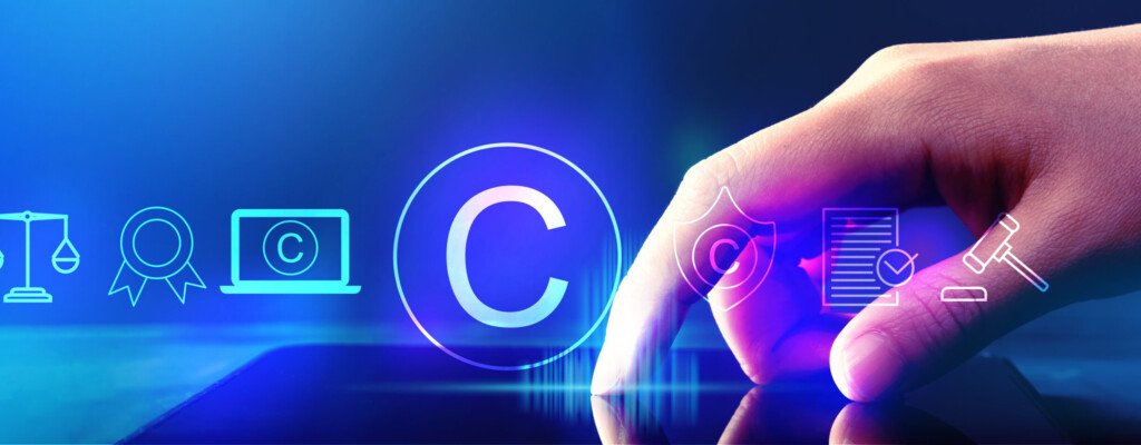 Copyright concept with hand pressing tablet computer screen